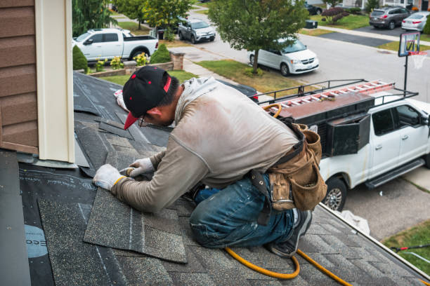Professional Emergency Roof Repair technician working in Marquette, MI